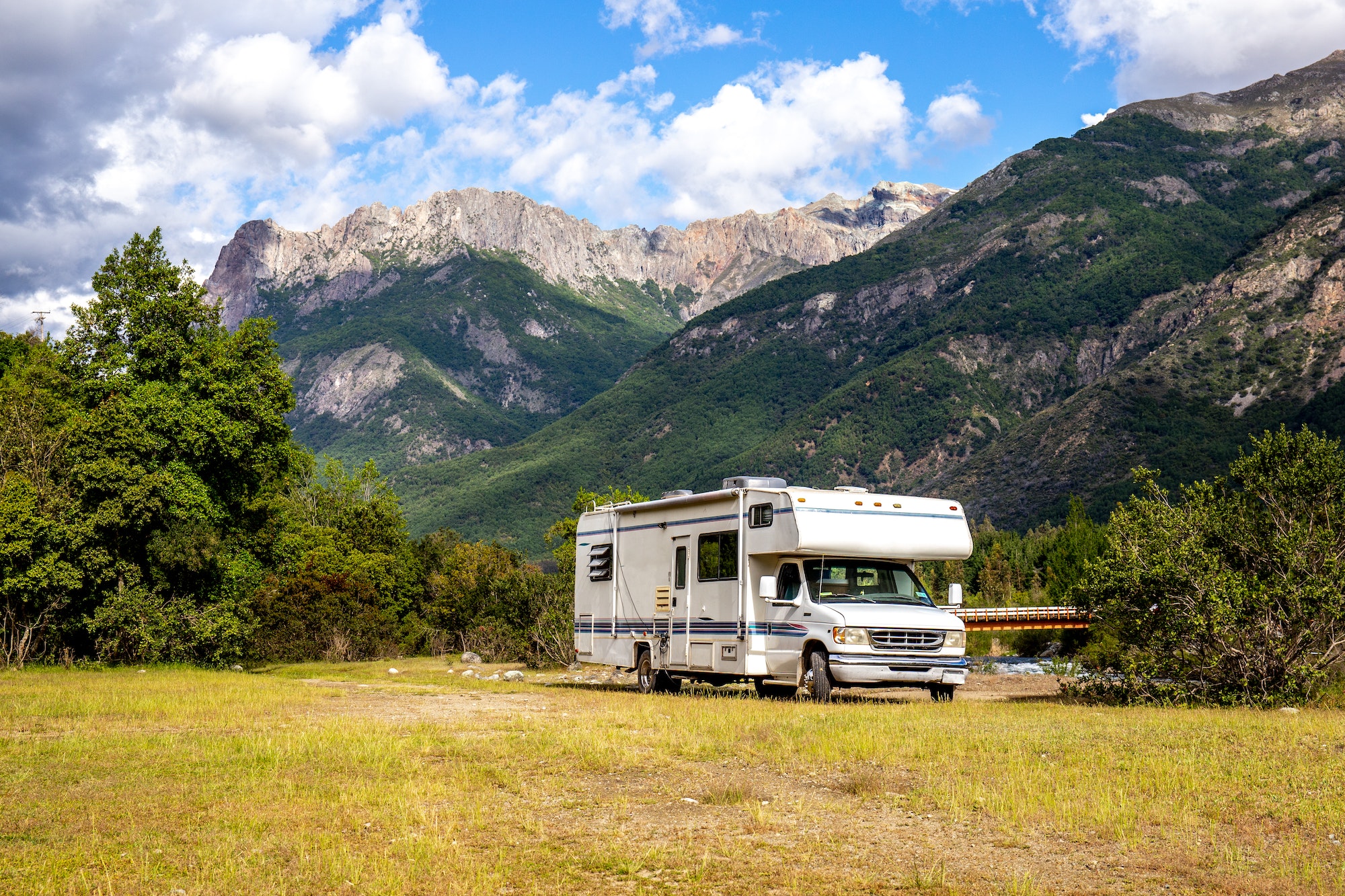 MOTORHOME RV In Chilean landscape in Andes. Family trip traval vacation in mauntains.