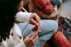 women knitting up close