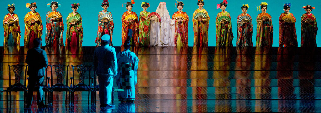 women in geisha costumes on stage