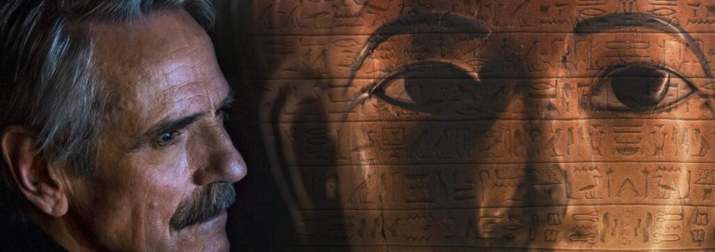 man looking at Egyptian pharaoh