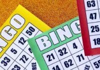 Many colorful bingo boards or playing cards for winning chips