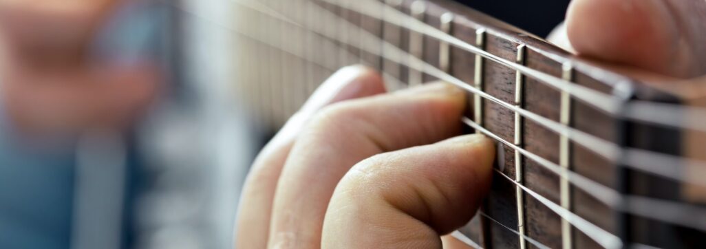 playing on electric guitar