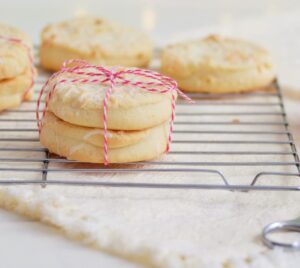 Shortbread cookies wrapped in red and white twine