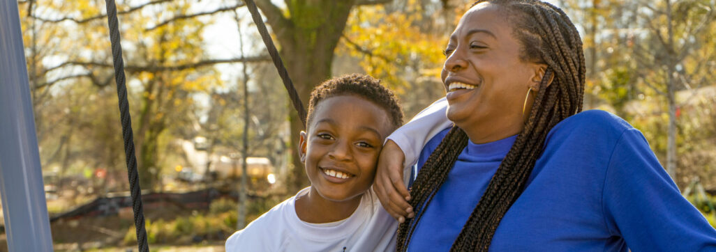 woman and child laughing