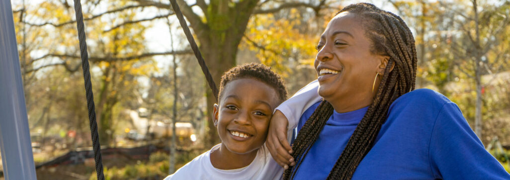 woman and child laughing